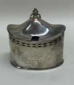 A good oval hinged top silver mustard pot with bright cut decoration.