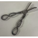 An unusual pair of silver grape scissors. London 1987. By R&K. Approx. 105 grams.