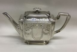 A good quality silver bachelor's teapot of shaped form.