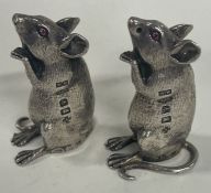 A fine pair of silver salt and peppers in the form of mice. Birmingham 2000.