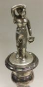 A heavy late Victorian silver figure of a lady. Approx. 94 grams