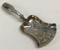 A George III bright cut silver caddy spoon. Birmingham