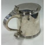 A heavy silver flat top lidded tankard. Birmingham 1931. By FC Richards.