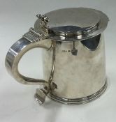 A heavy silver flat top lidded tankard. Birmingham 1931. By FC Richards.