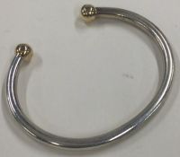 A heavy English silver and gilt bangle. Approx. 30 grams. Est. £30 - £50.