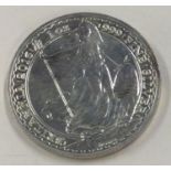 A fine 999 silver Britannia 2 Pounds coin. Approx. 30 grams.