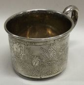 A 19th Century Continental silver chased mug. Approx. 53 grams.