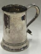 A large 18th Century George III silver pint mug. London 1792. Approx. 359 grams.