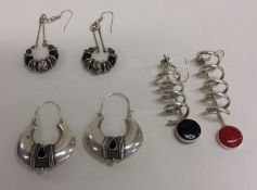 Three pairs of heavy silver earrings. Approx. 41 grams.