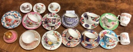 A collection of Royal Worcester cabinet cups and saucers.