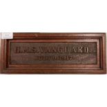 An old mahogany Naval plaque.