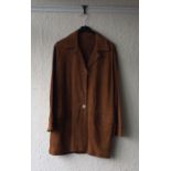 One sheepskin coat together with two other vintage coats.