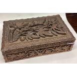 A carved Eastern box together with medals, knives etc.