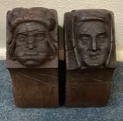 A pair of Antique oak wall mounts carved with figures.