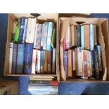 BOOKS: Two boxes of various books.