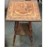 A small carved occasional table.