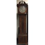An old oak grandfather clock with silver dial. By John Lee Wycombe.