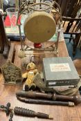 An old Military compass together with a teddy bear, gong etc.