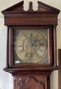 A Georgian mahogany grandfather clock with brass dial