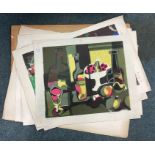 A large collection of unframed pictures.