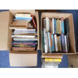 BOOKS: Two boxes of various books.