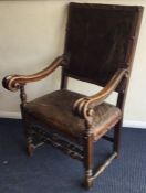 A good early scroll armed carver chair with turned