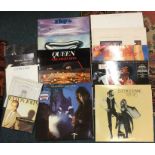 A large collection of Queen, Elton John and other records.