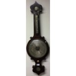 A mahogany banjo barometer.