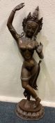 A large brass and copper mounted figure of an Eastern dancing lady.