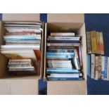 BOOKS: Two boxes of various books.