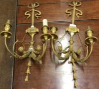 A pair of good quality brass wall mounts.