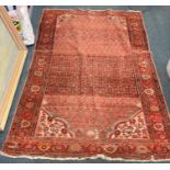 A good red tapestry rug with floral border.