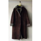 A GIEVES of LONDON vintage coat together with three leather coats and one other vintage coat.