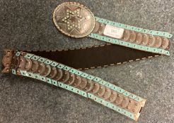 An old Eastern belt with enamelled decoration.