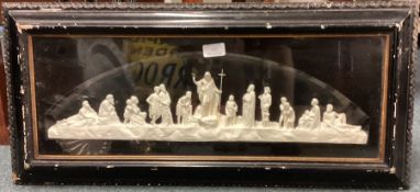 A good framed and glazed statue depicting a religious scene.