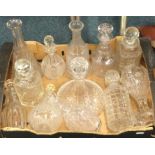 A good collection of glass decanters.