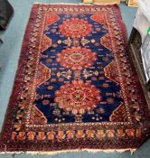 A good tapestry rug in blue ground.