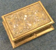 TIFFANY & CO: An unusual gilt hinged top box with agate panels.