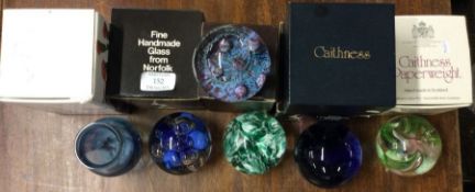 A good collection of six Caithness glass paperweights etc.