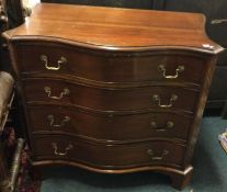 A good serpentine chest of four drawers.