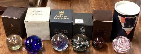 A good collection of six Caithness glass paperweights etc.