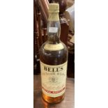 A large bottle of Bells Scotch whisky.