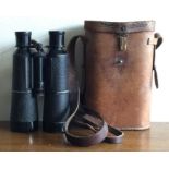 A good pair of marine field glasses in leather carrying case. By Hemsoldt.