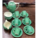 A good Susie Cooper part coffee service decorated in green ground.