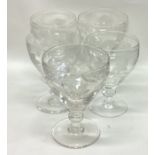 A good set of five etched stem glasses decorated with vines and leaves.
