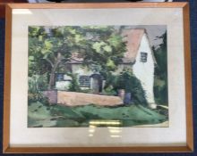 A framed and glazed watercolour depicting a cottage in Weldford England.