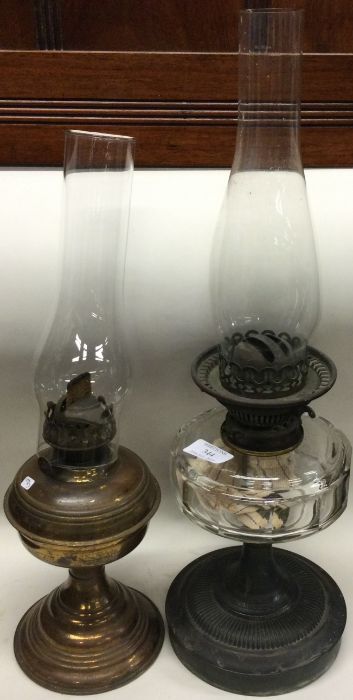 Two old oil lamps.