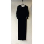 A vintage black velvet evening dress.