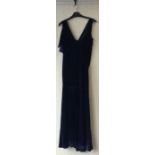 A vintage blue velvet evening dress.