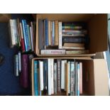 BOOKS: Two boxes of various books.